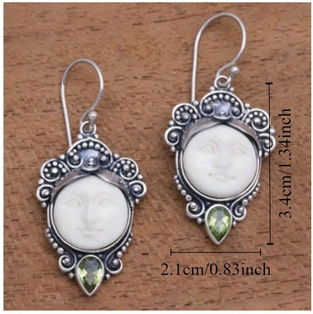 Silver Tone Moon Face Earrings With Crystal Accents