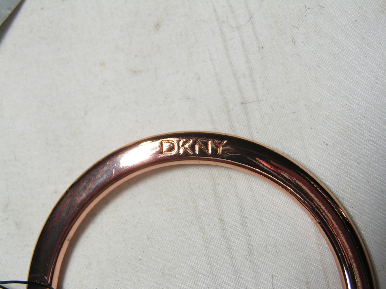 …DKNY Donna Karan…Rose Gold Tone Wavy Design Bangle Bracelet…Small Size…