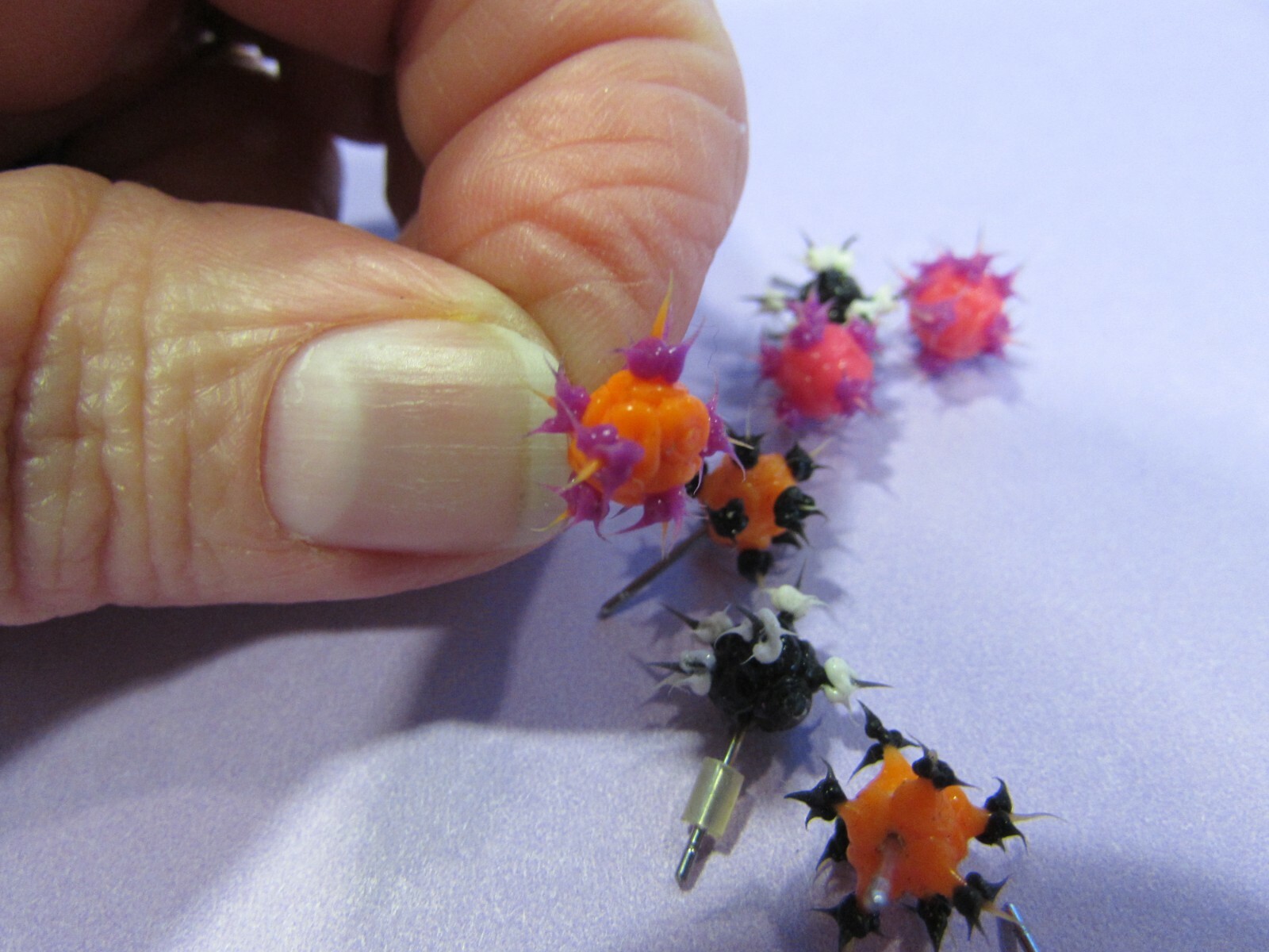 4 pair rubber pierced post earrings pink, purple, orange, black, white – 1 back