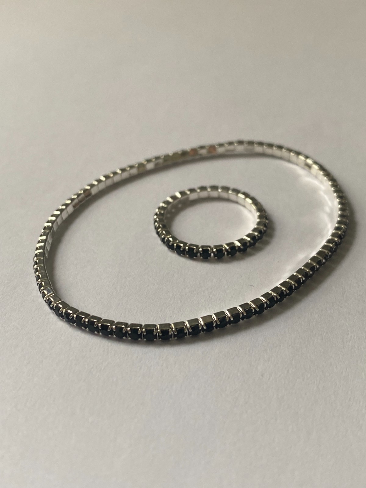 5 stretchy bracelets and 4 stretchy rings, shiny and new