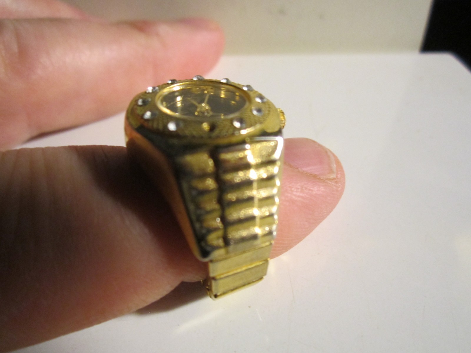 2 WATCH CLOCK RINGS -BOTH FANCY DESIGNS AND NEED BATTERIES TO RUN – OFC-R1