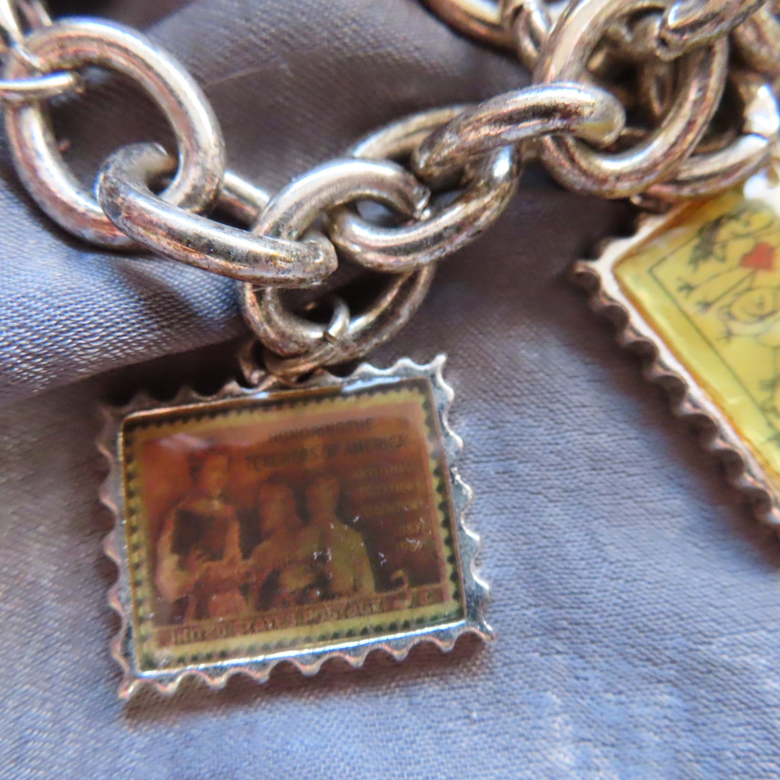 Education themed US Postal Stamp charm bracelet, silver-tone