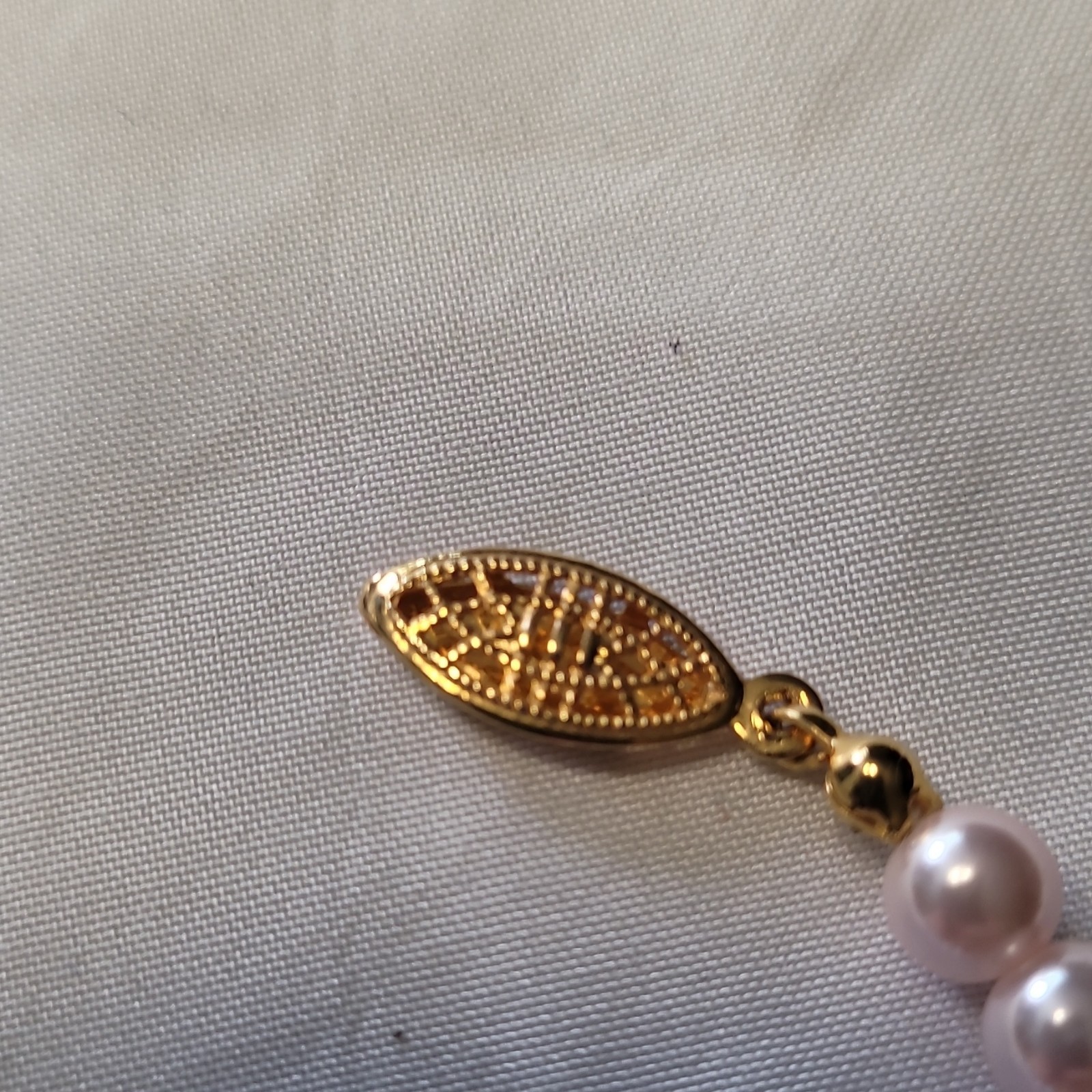 Pink cultured freshwater pearl necklace and earring set with gold-tone clasp