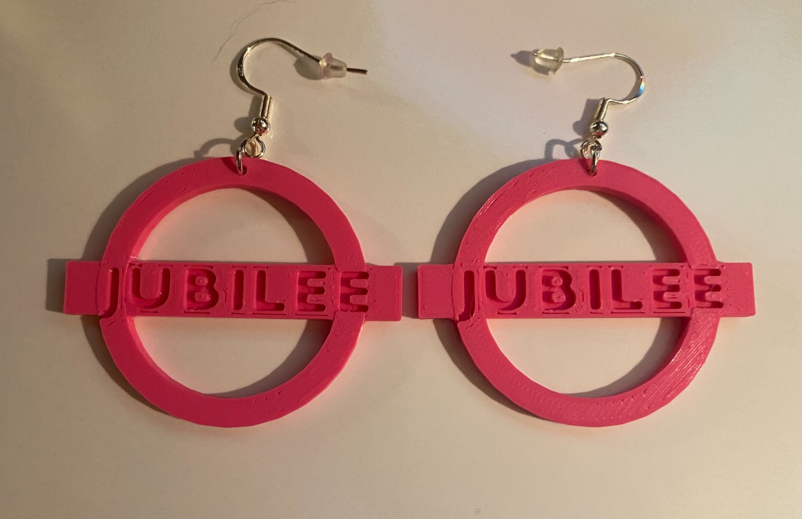 3D-printed earrings based on Jubilee from the X-Men franchise