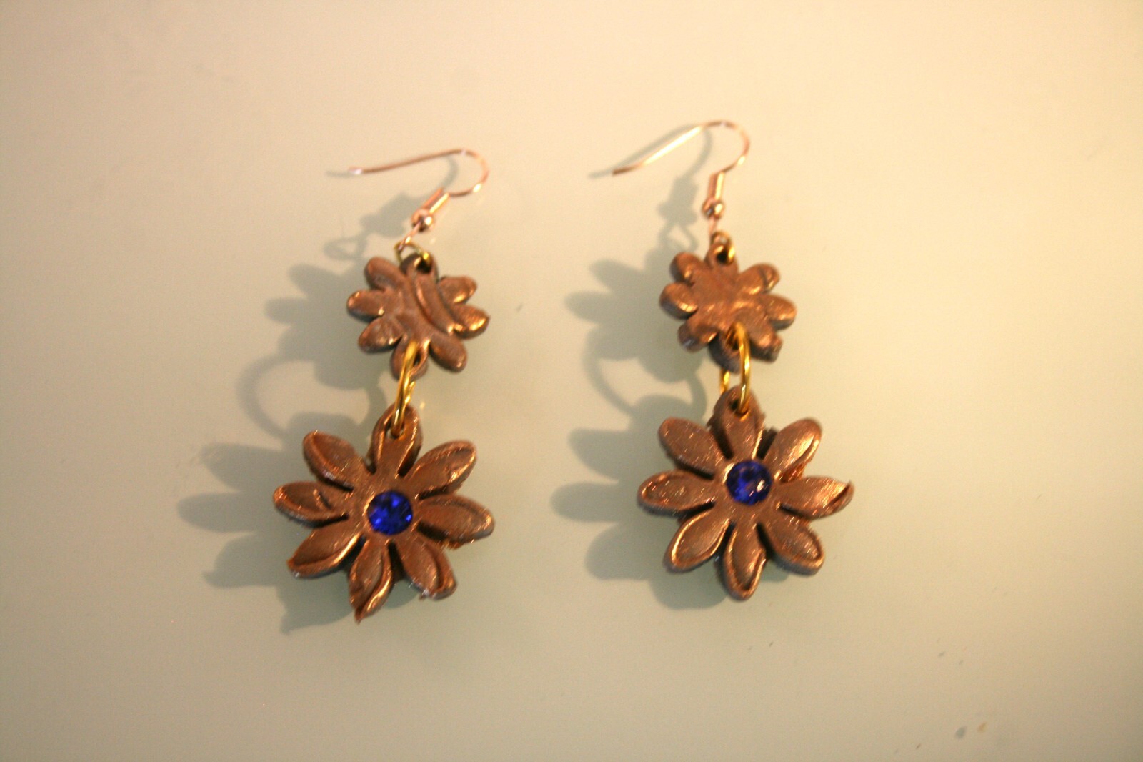 Gold tone golden & gray daisy, blue crystal polymer clay dangle earrings 2 1/2″