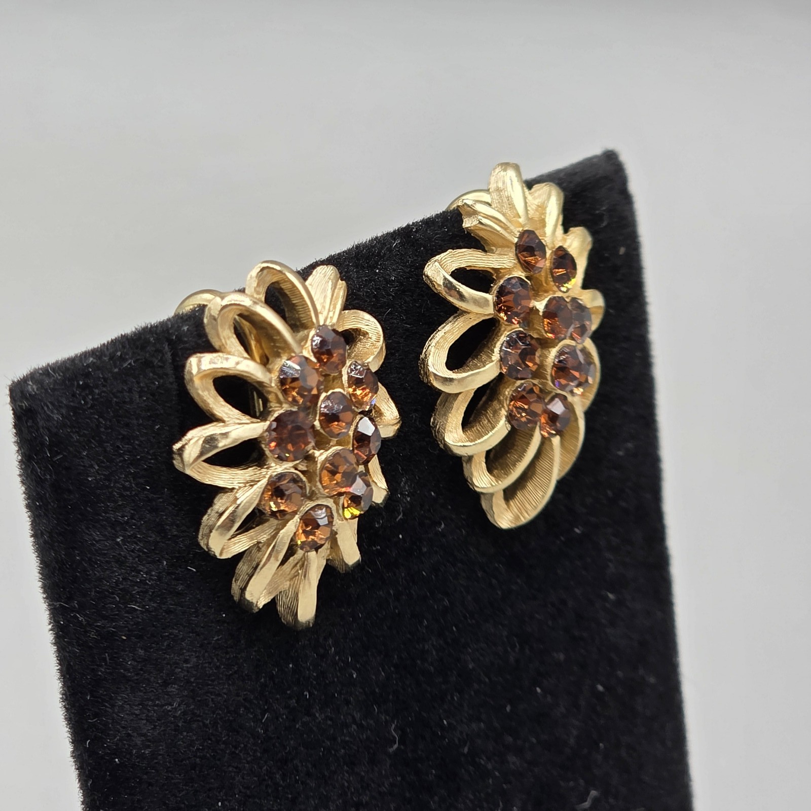 Vintage Trifari Gold Tone Floral Clip On Earrings with Brown Rhinestones