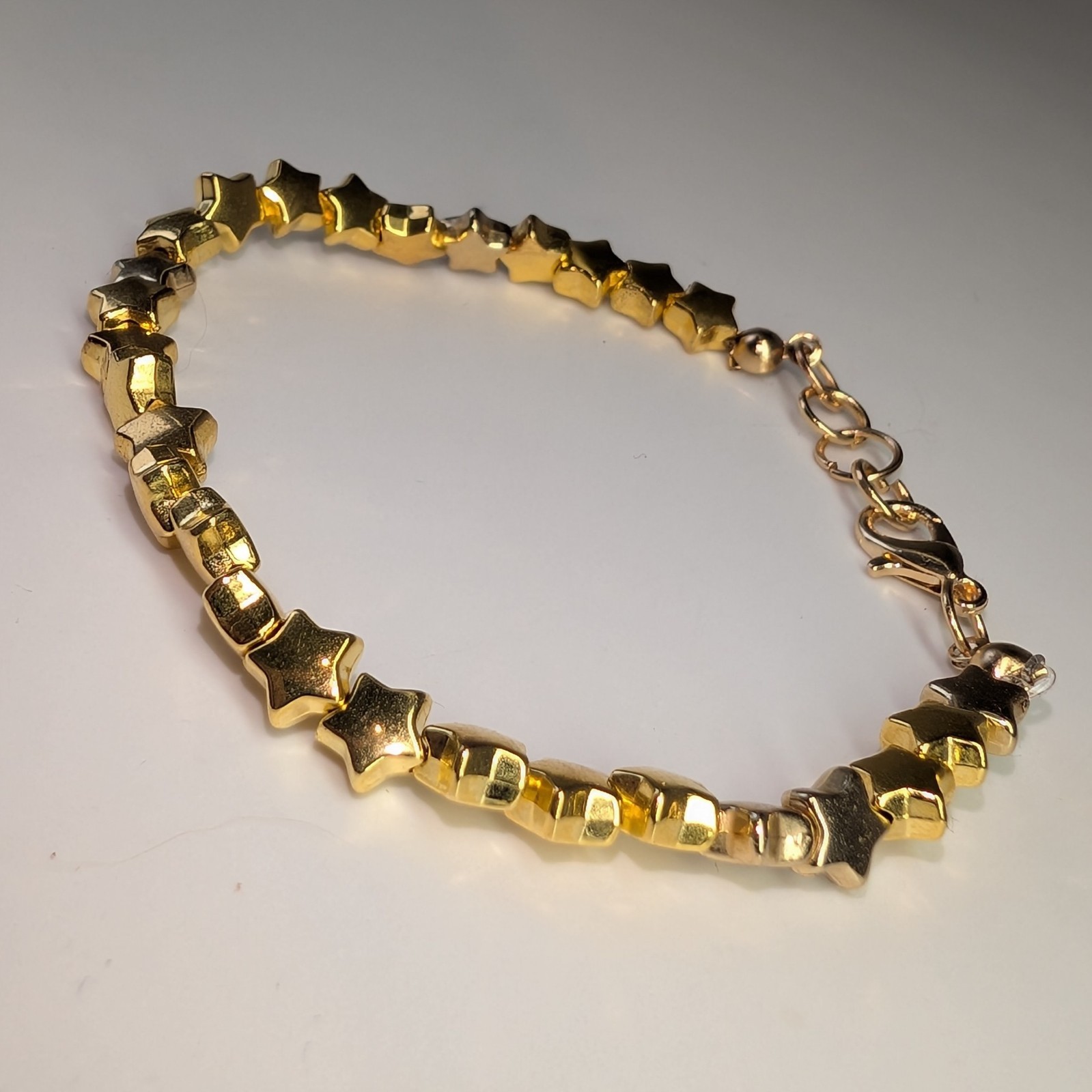 Lot of 3 Gold Tone Bracelets with Star Heart And Geometric Beads, Lobster Clasp
