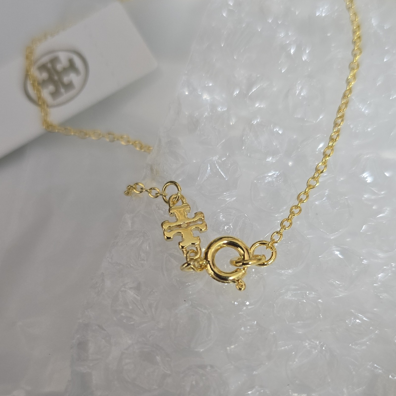 Tory Burch Gold Tone Mother of Pearl Heart Charm Pendant Necklace Cable Lobster