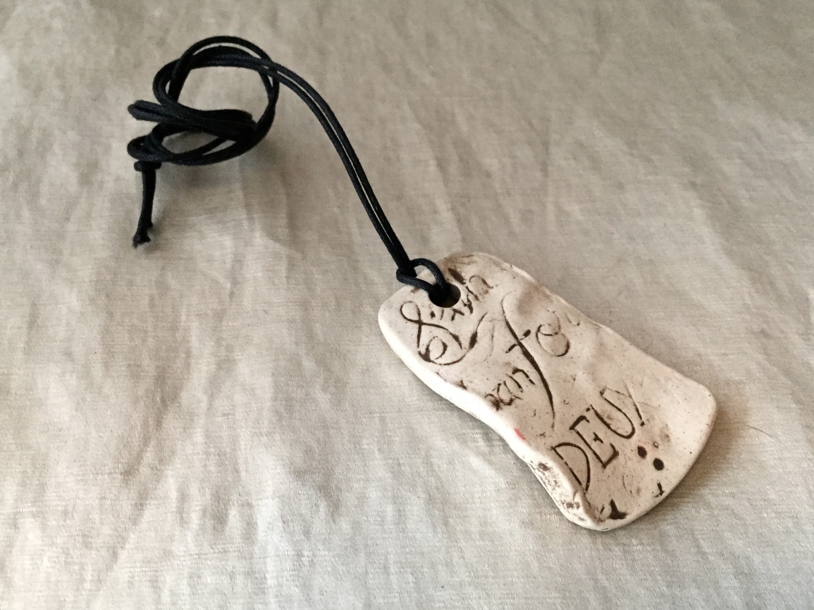 Vintage Unworn Donna Karan Ceramic ” Words” Pendant