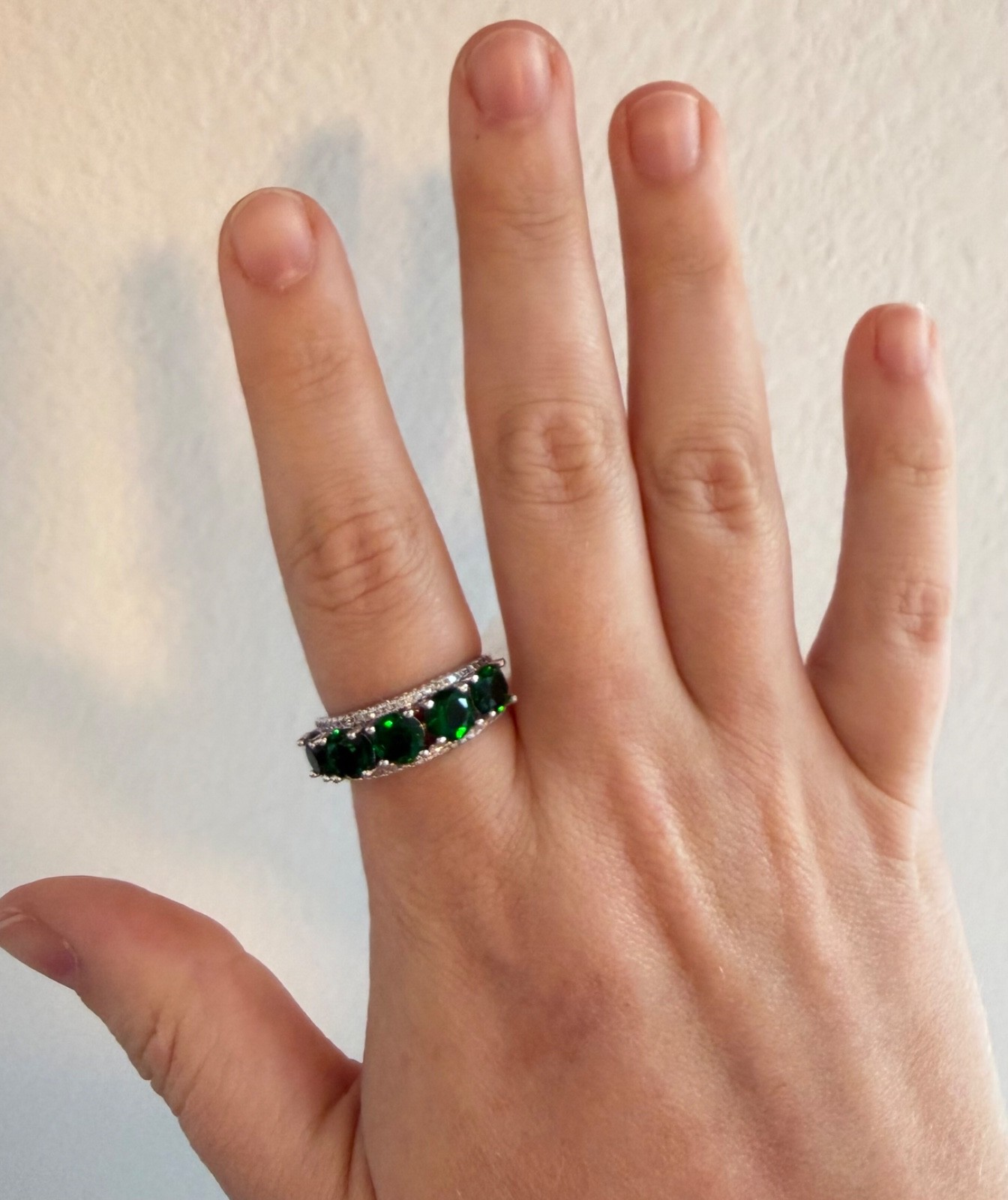 Simulated green diamond ring set in silver tone, size 8.5