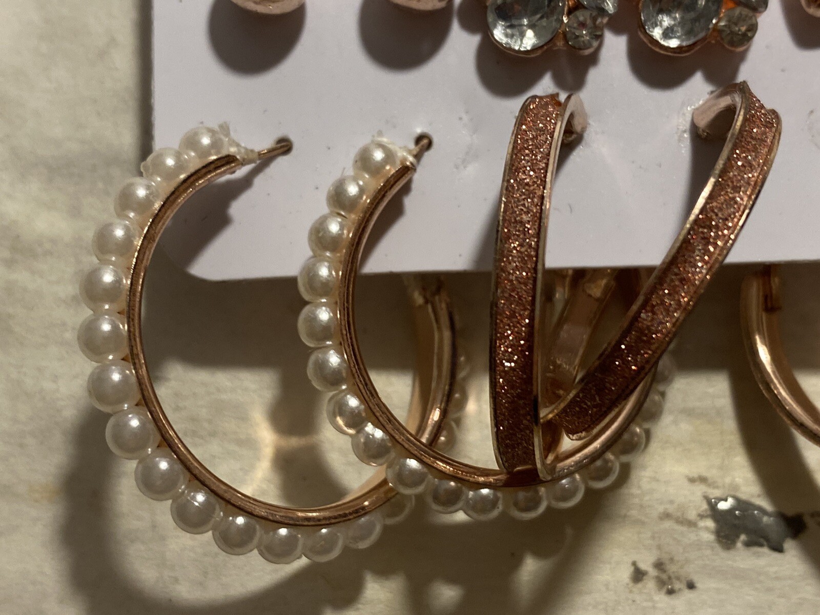 8 Pair Of Pierced Earrings On A Card