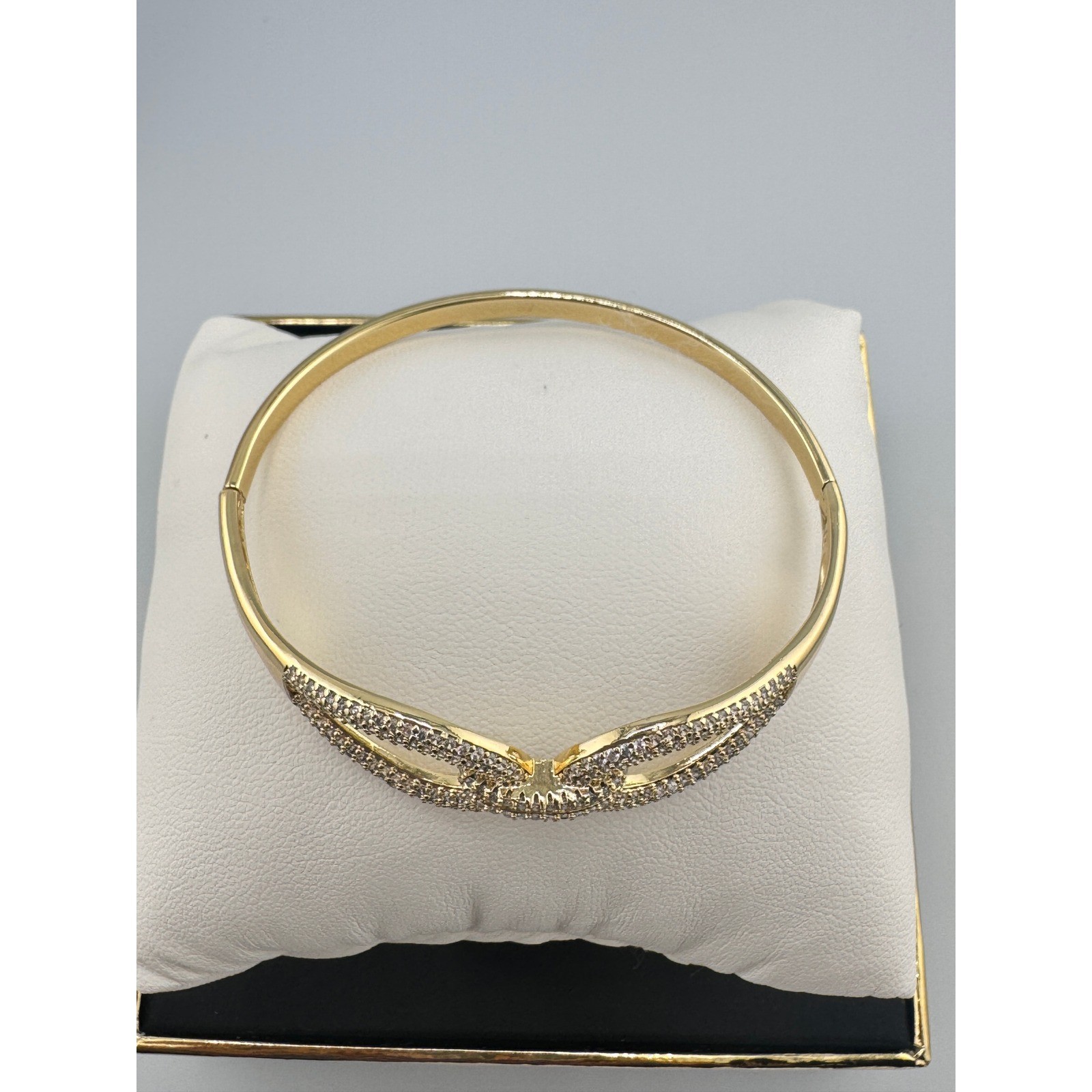 Gold Tone with Pave Crystal Baguette Hinge Bangle Bracelet