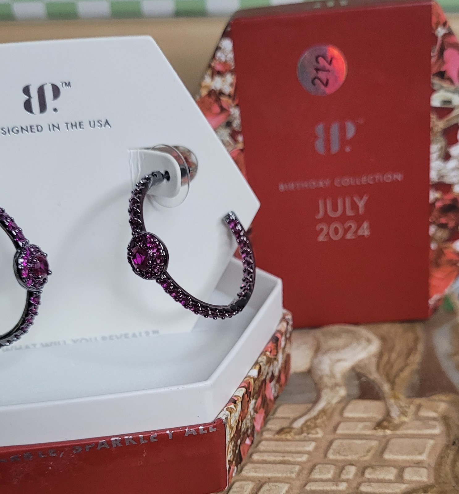 Bomb Party July 2024 Earrings “Wish Them Joy” Lab Created Ruby /Hematite Plating
