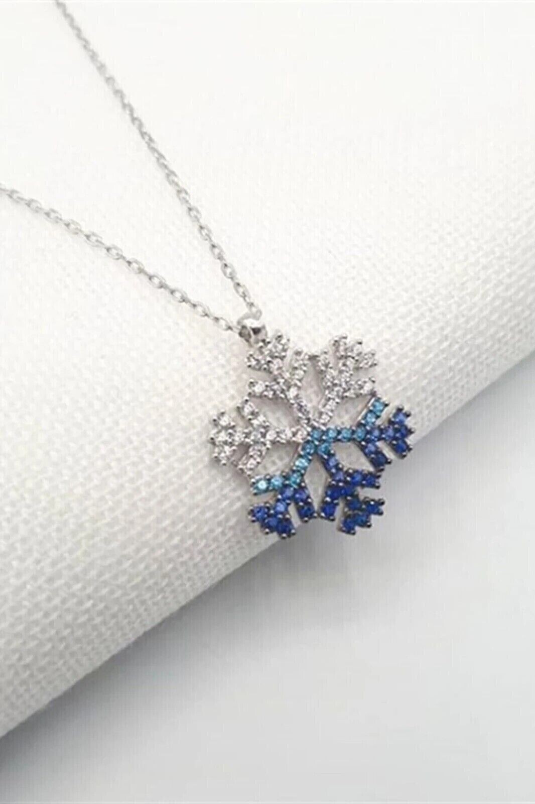 Round Cut Simulated Sapphire Snowflake Women’s Pendant In 14K White Gold Plated