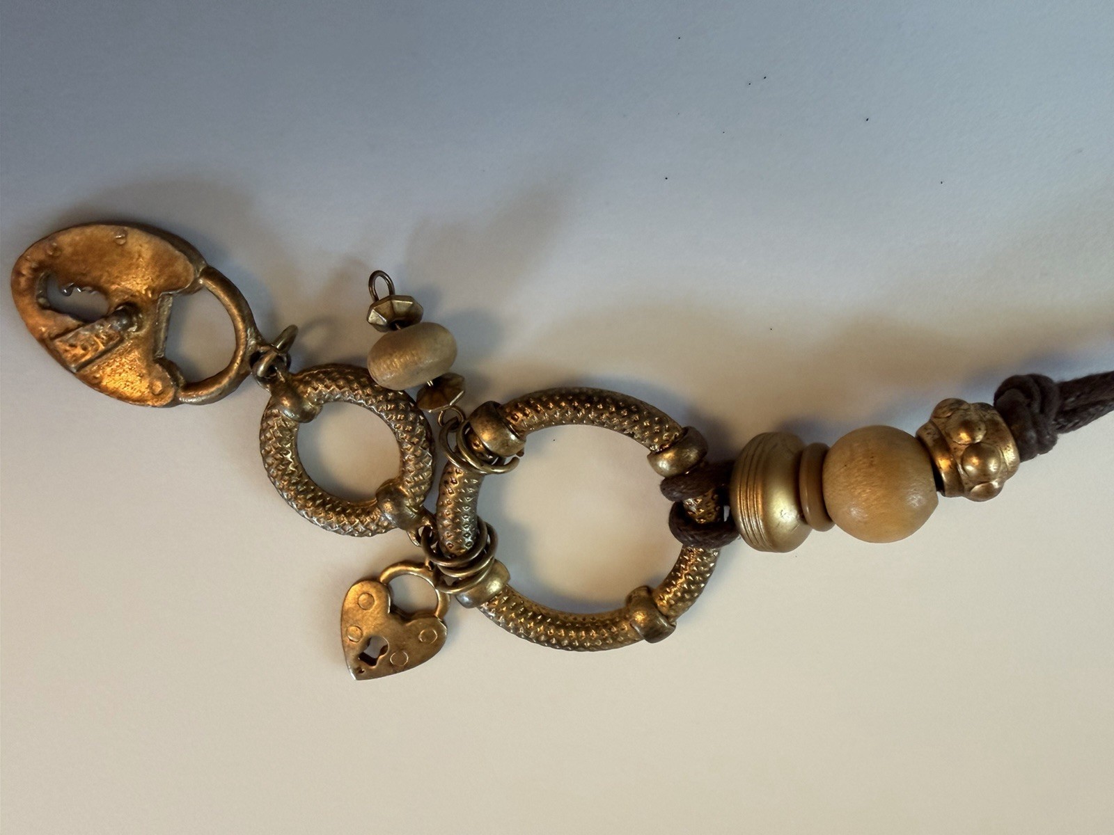 Brown Cord Necklace 20in Adjustable Gold Tone Heart Lock Charm Beads Rings