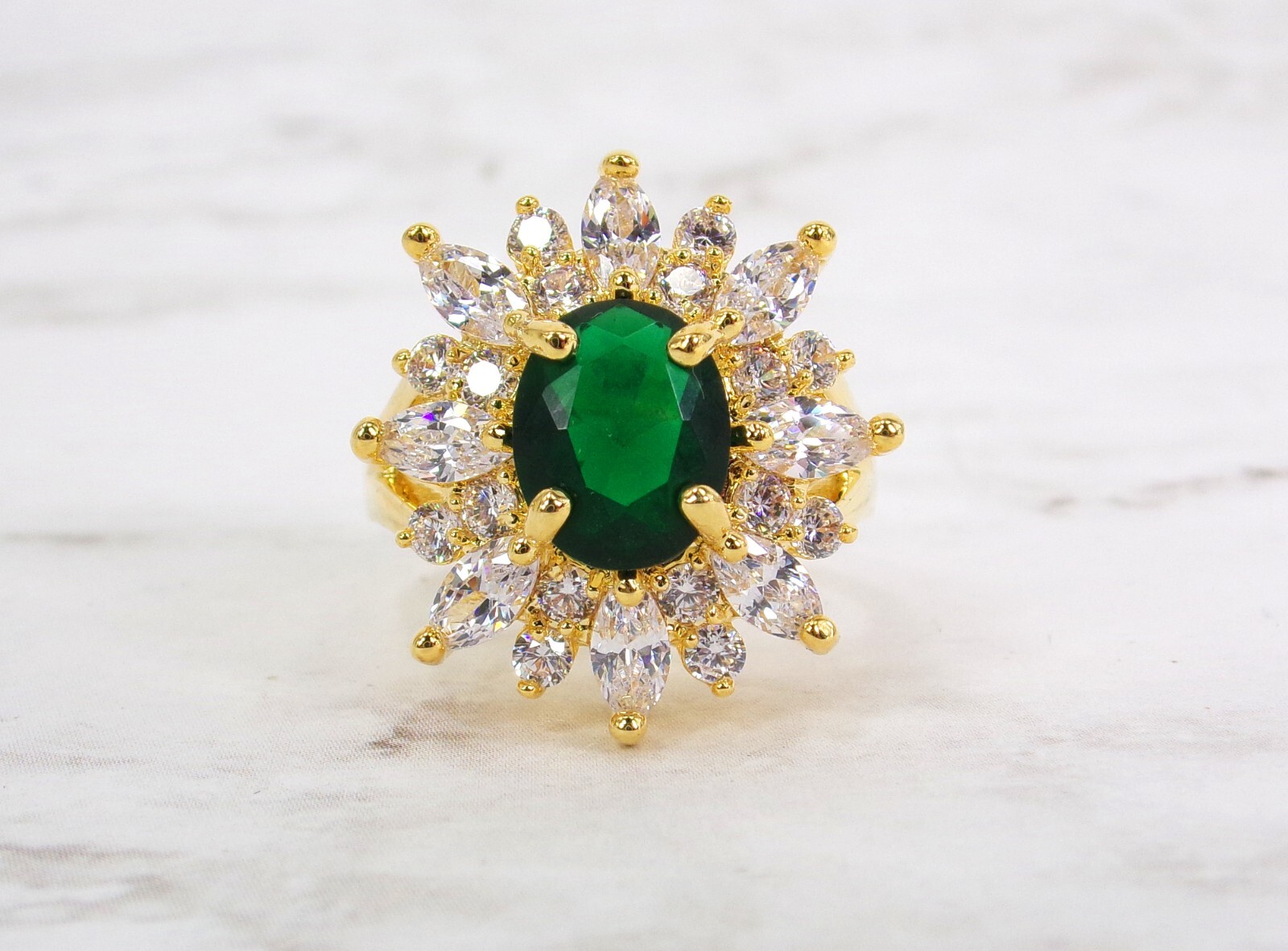 Large green oval cubic zirconia stone ring with clear marquise round CZ stones