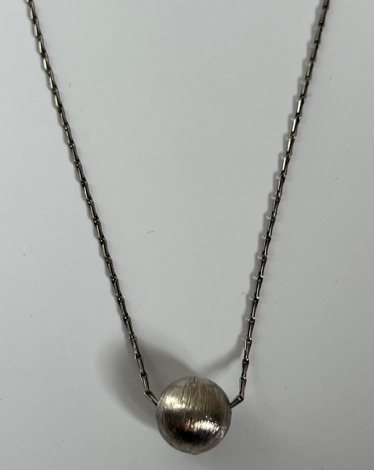 NIB Saint Laurent YSL Spherical Ball Pendant Silver Brass Chain Necklace $695