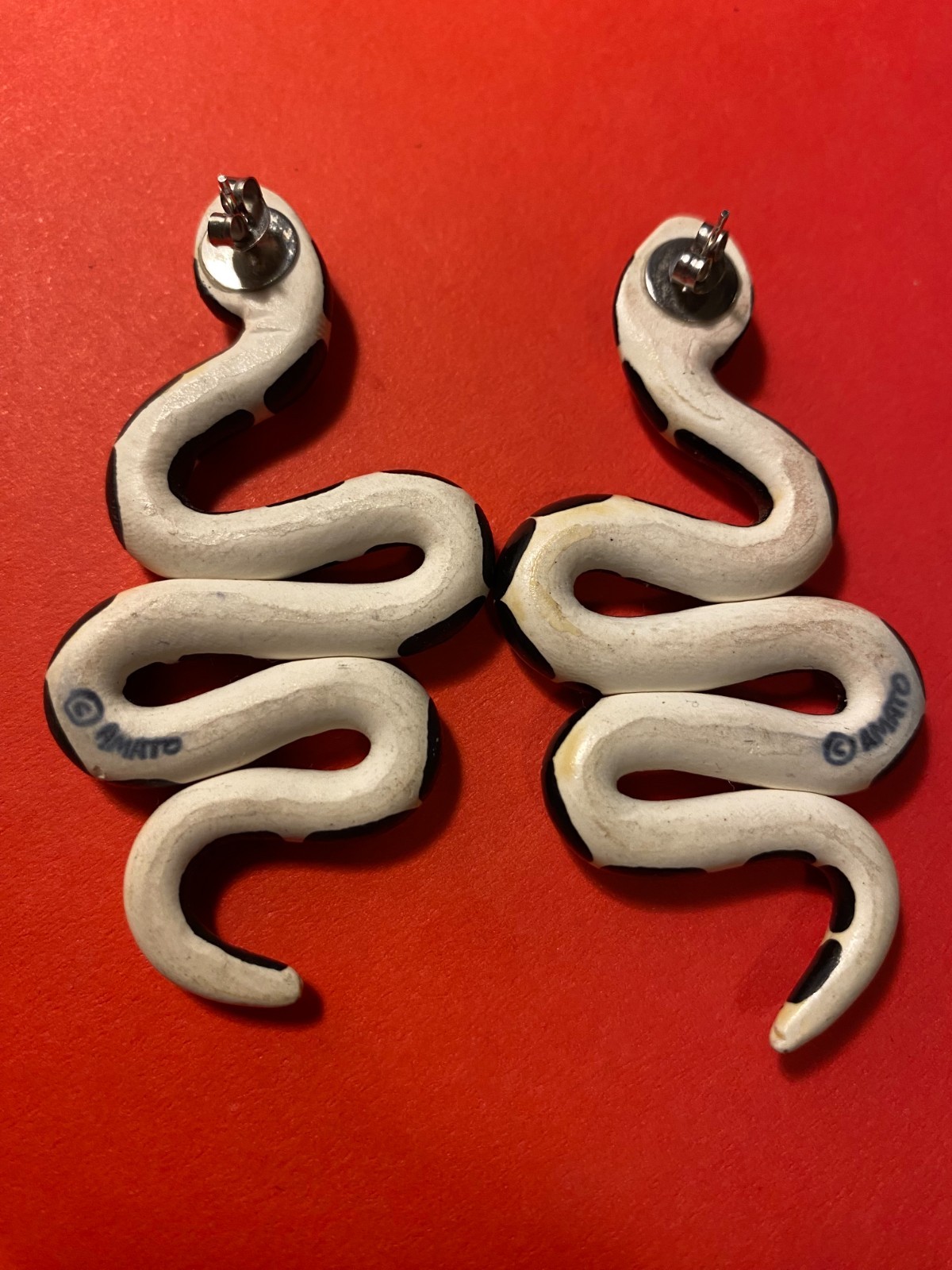 Dramatic large Amato graphic black-and-white King snake stud earrings