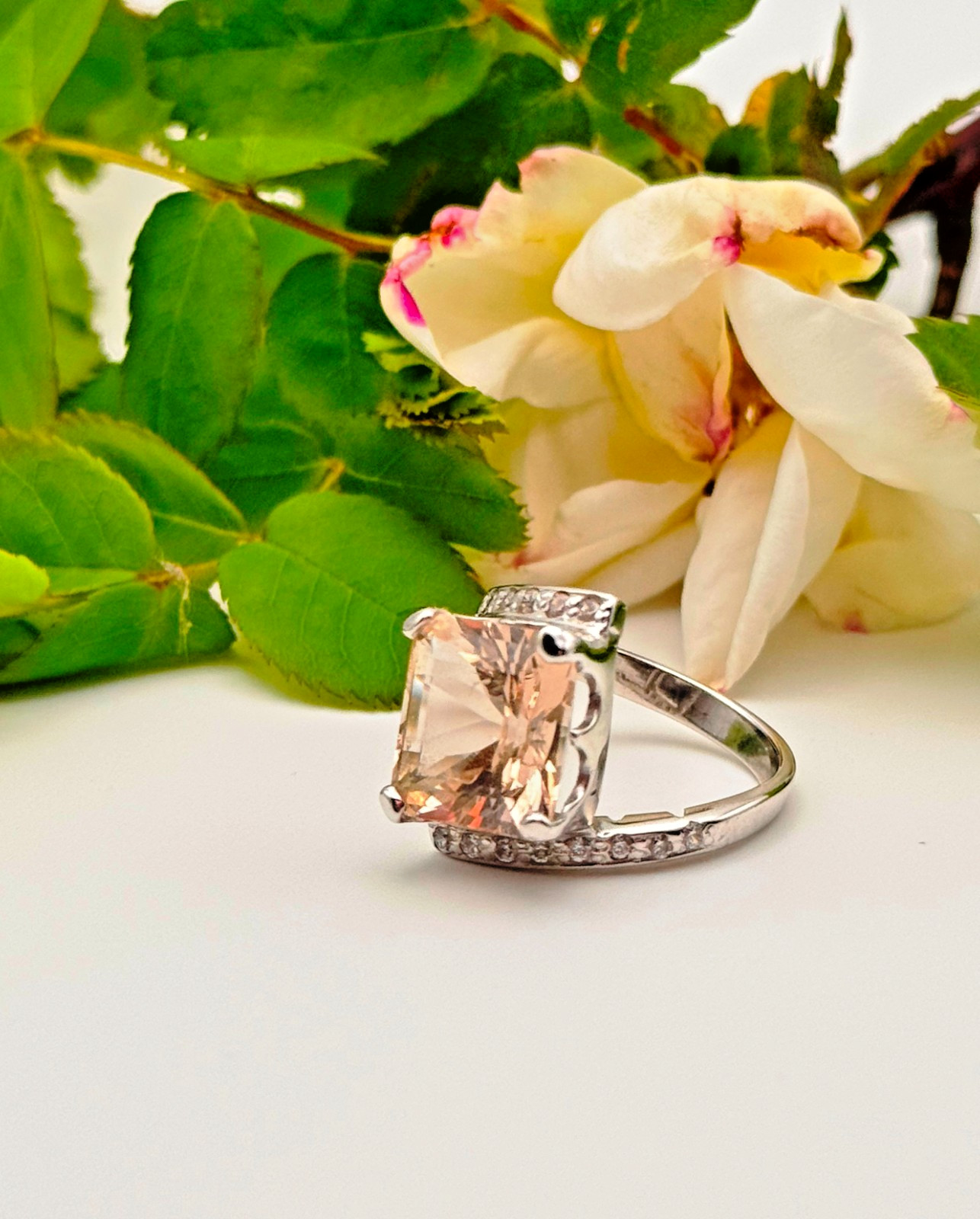 Emerald cut topaz paired with sparkling zircon, set in handcrafted 925