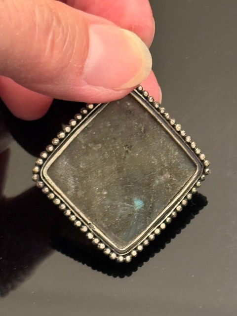 Square-cut natural labradorite pendant set in a textured silver frame. Vintage.