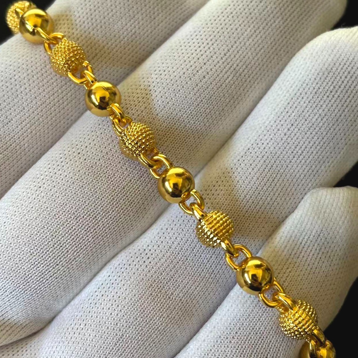 Golden Gold-tone Ball Bracelet Chain marked ‘ 999 ‘, 7-8.5 in adjustable