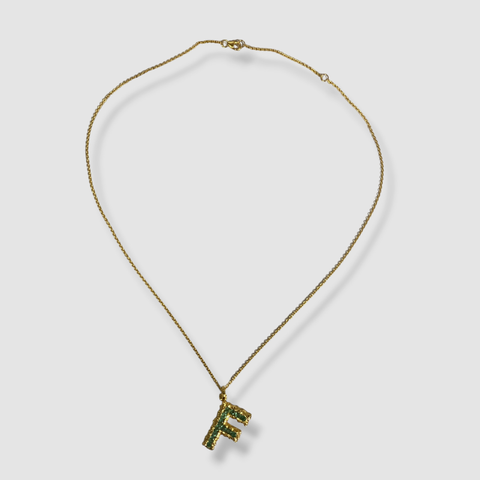$910 Pacharee Women’s 18K Yellow Gold Plated Emerald Alphabet “F” Necklace