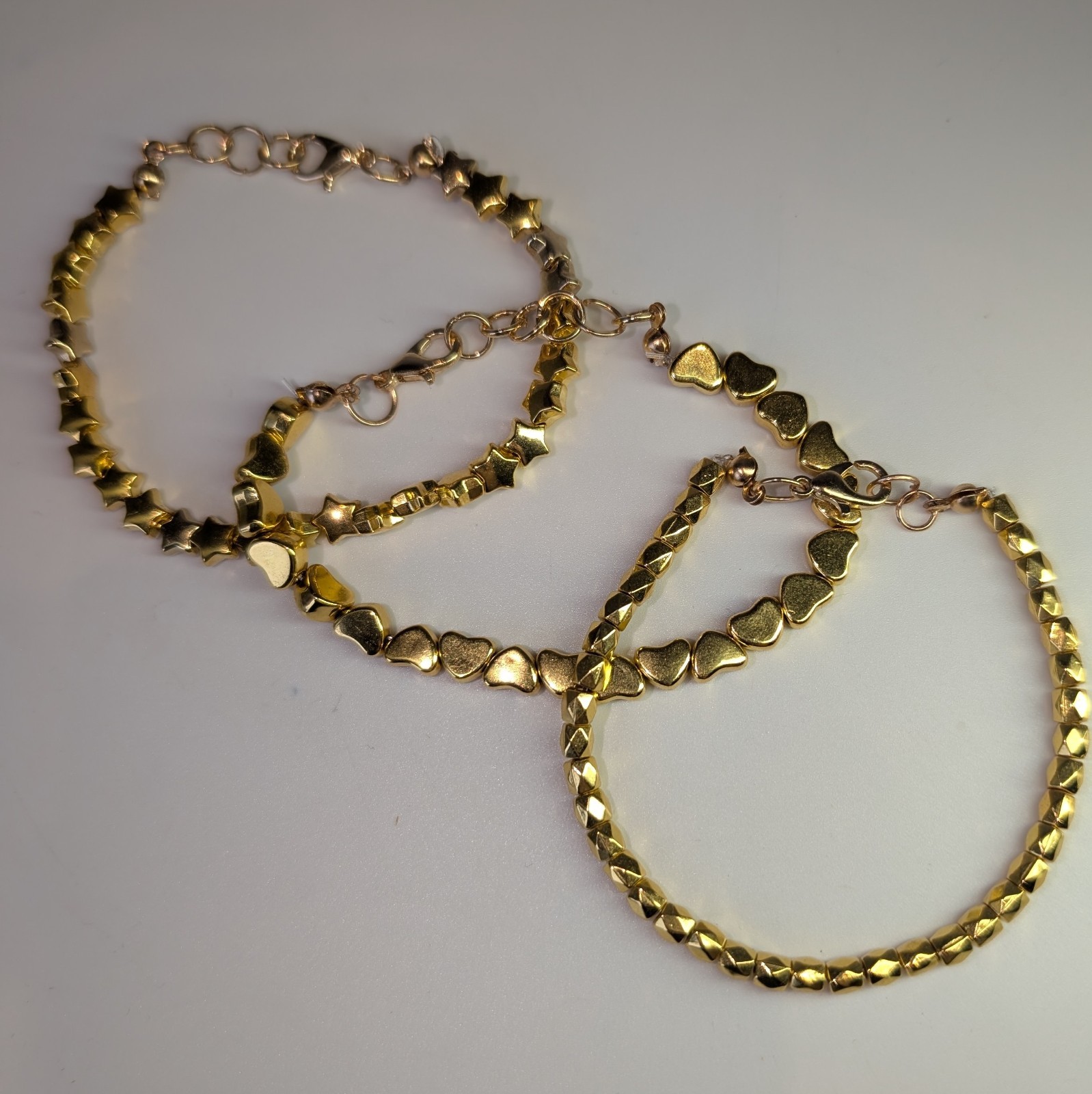 Lot of 3 Gold Tone Bracelets with Star Heart And Geometric Beads, Lobster Clasp