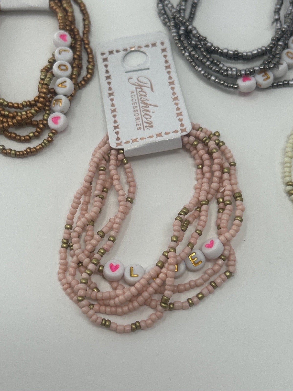 4 NWT Fashion Accessories Stacked Elastic Bead LOVE Bracelets Pink Cream Silver