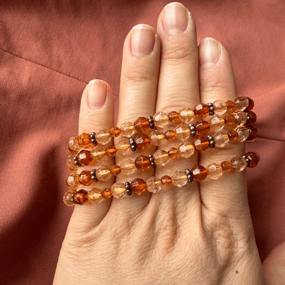 Y2K Multi-stranded Bracelet with a faux Amber Glass, Gems Statement Pendant