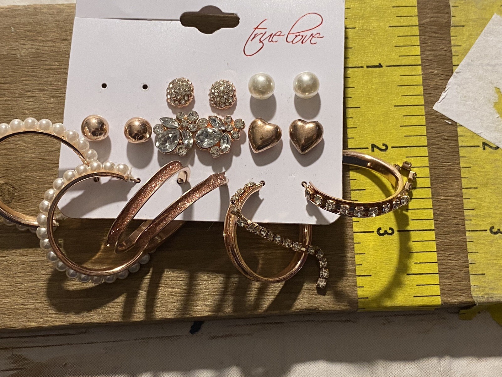 8 Pair Of Pierced Earrings On A Card