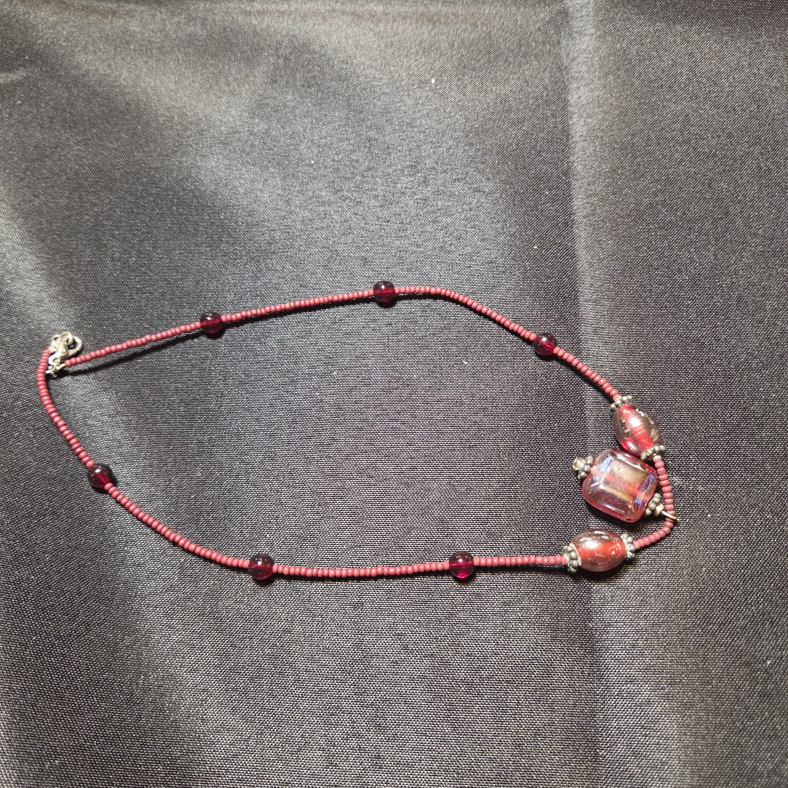 Burgundy Glass Beaded Necklace With Pendant.