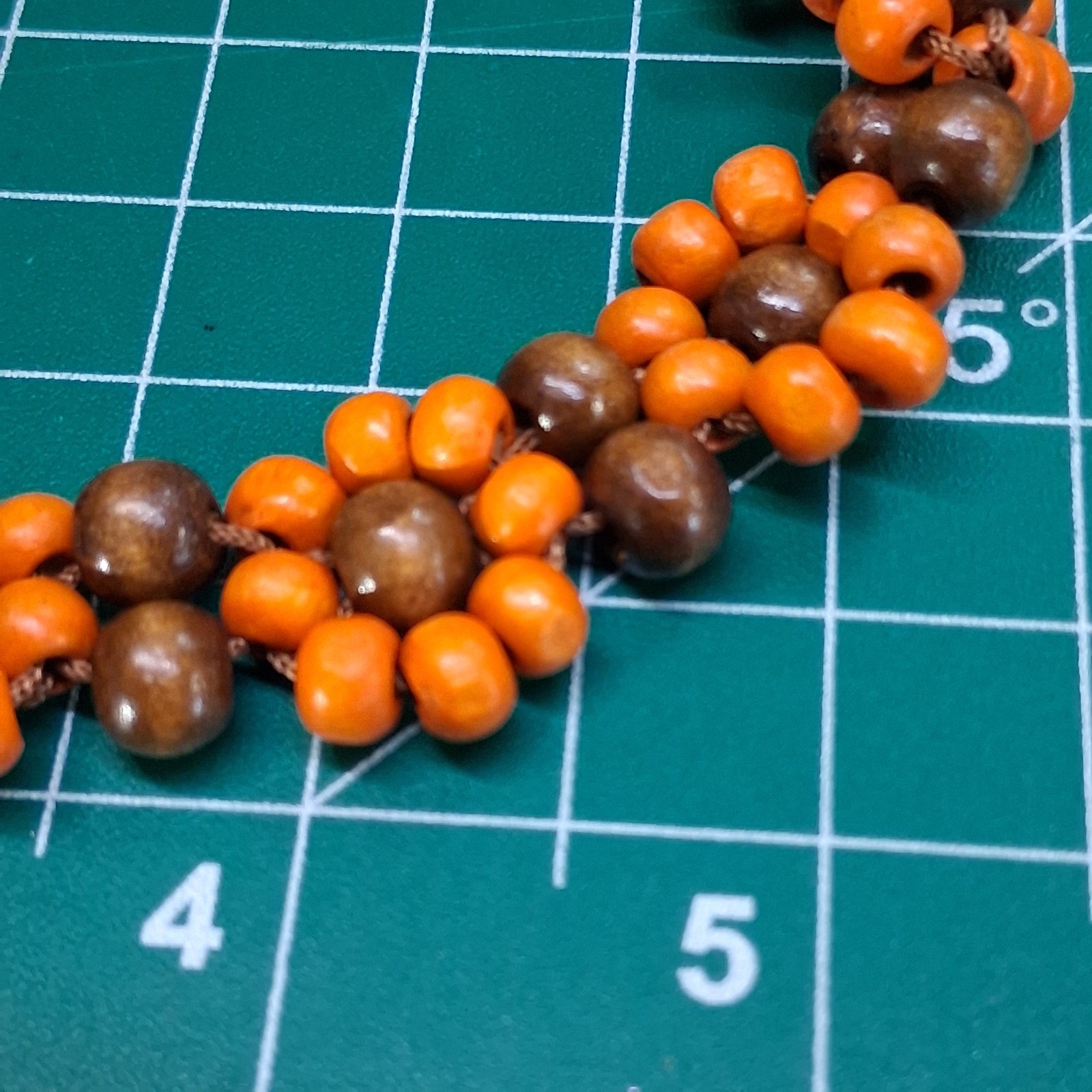 Orange & Natural Wood Channel Set Bead Adjustable Size Brown Cord Bracelet