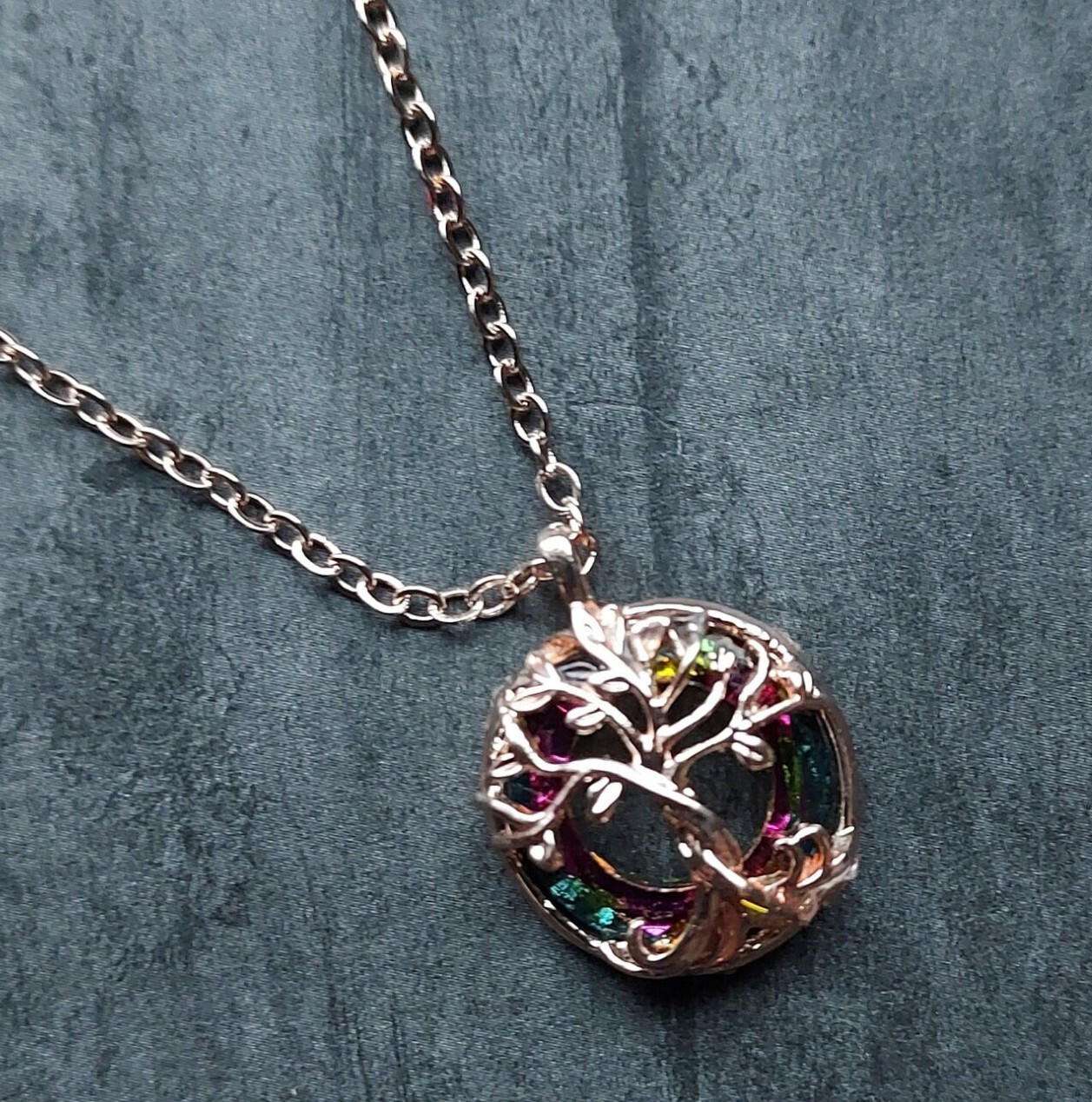 Copper-Rose Tree of Life – gnarled tree with crystal circle glass framing.