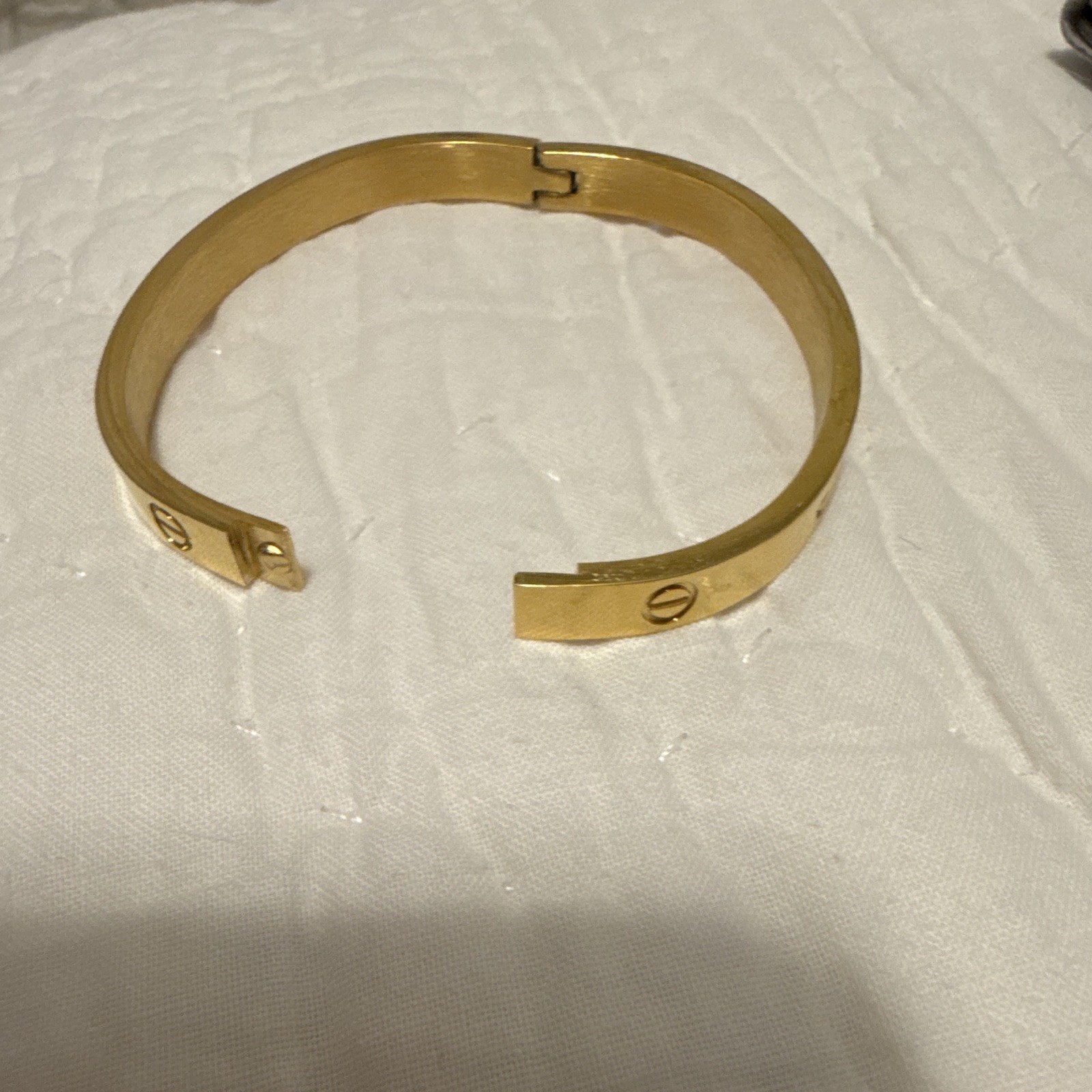 Gold Tone Logo Motif Bangle Bracelet, No Stone, Gold Color Jewelry
