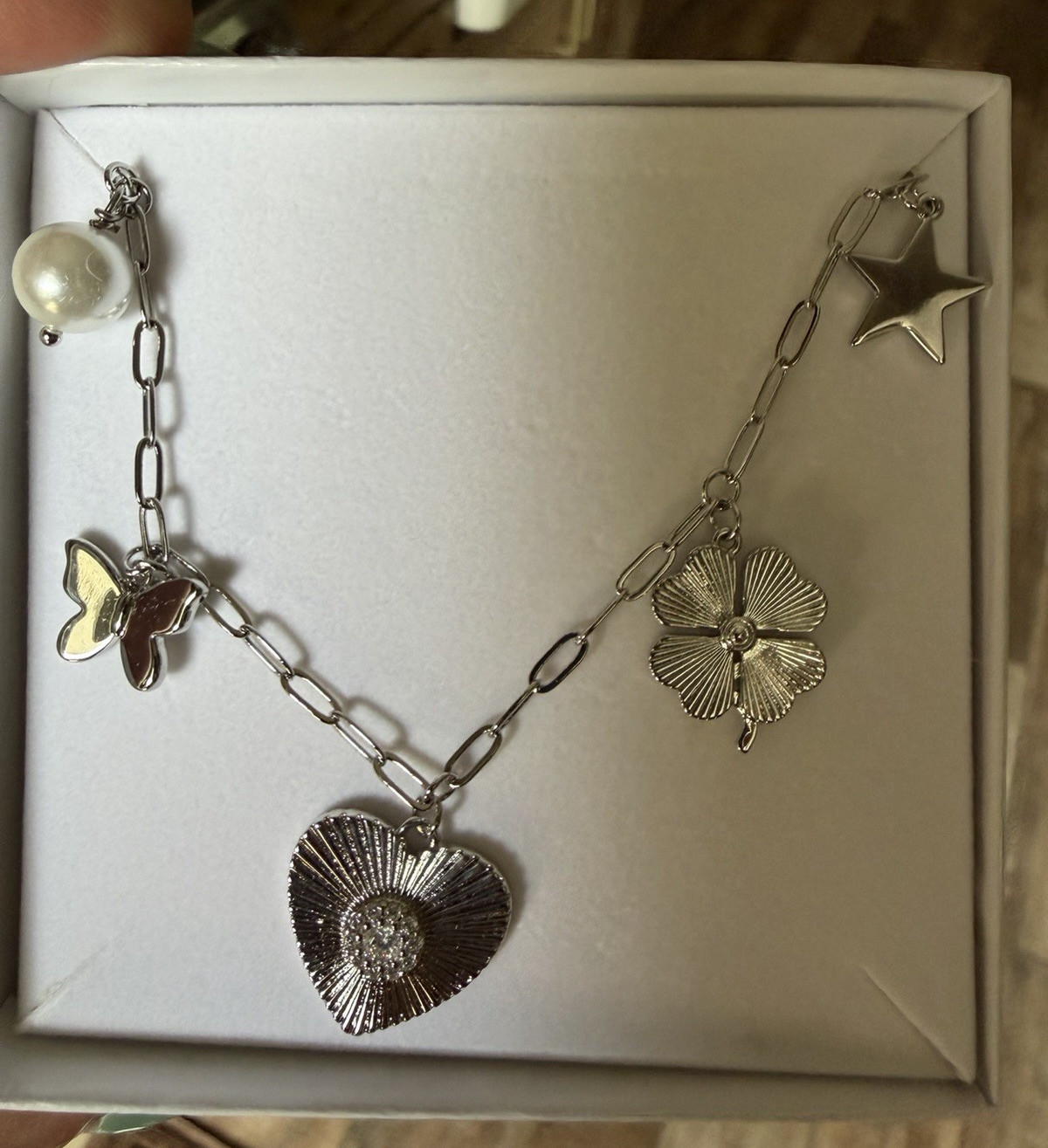 Jennifer miller silver charm necklace
