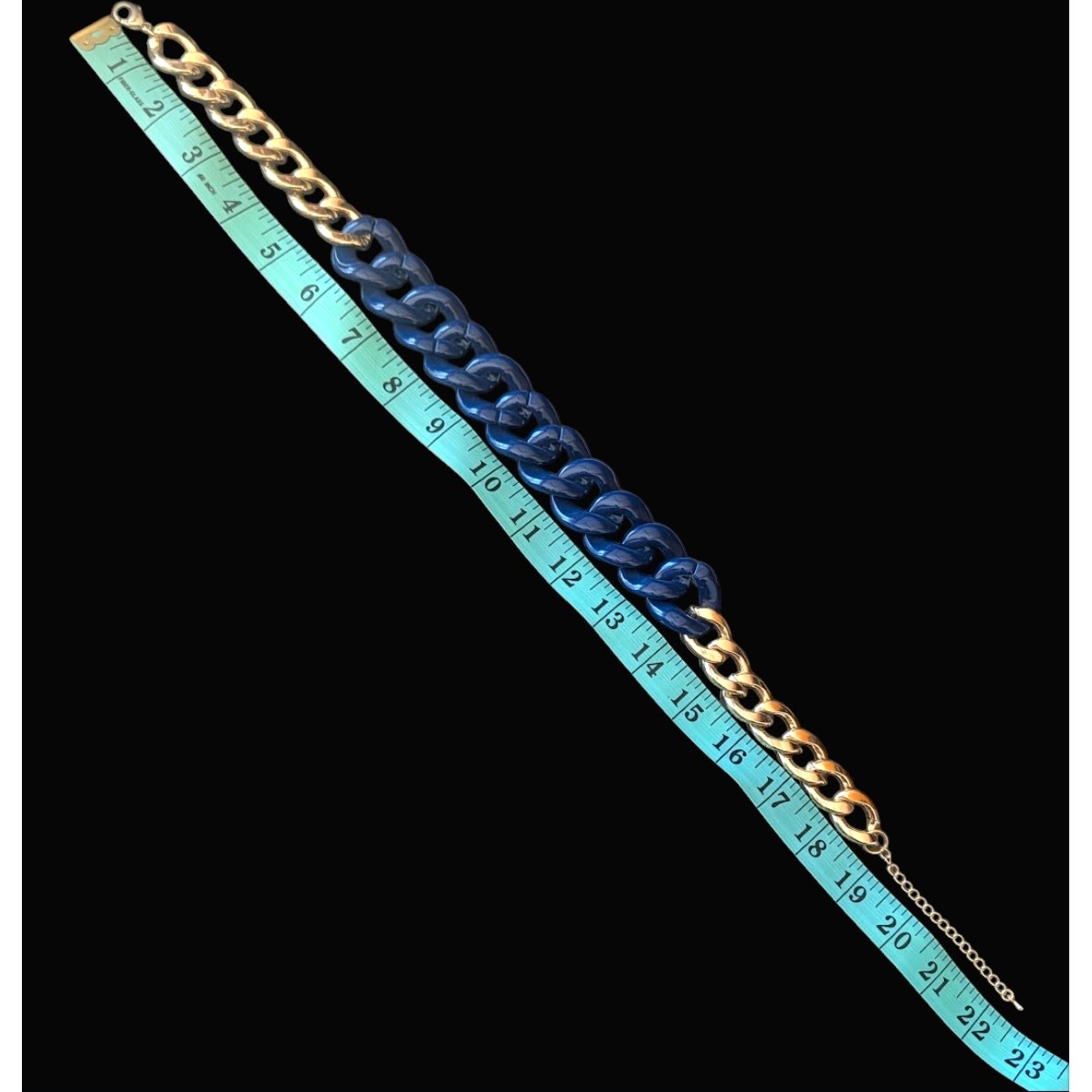 Gold tone and navy plastic / resin heavy chain link necklace