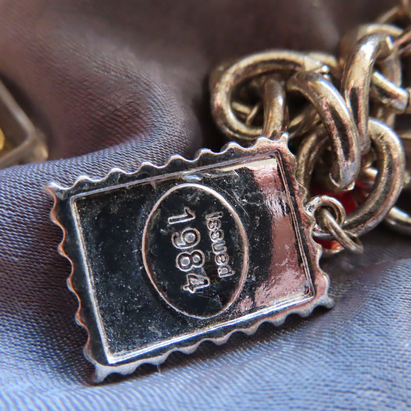 Education themed US Postal Stamp charm bracelet, silver-tone