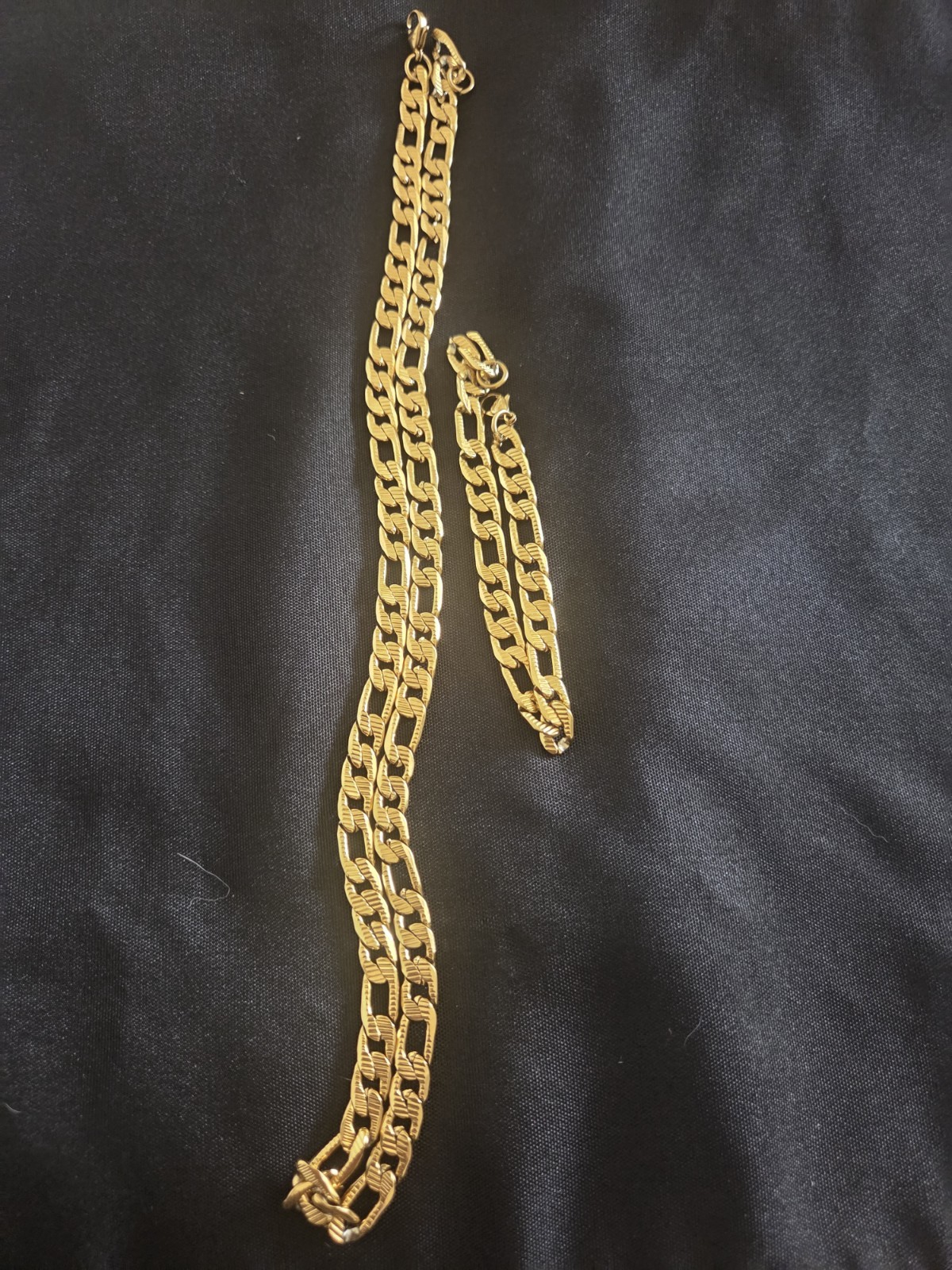 Gold Tone Figaro Chain Bracelet with Lobster Clasp, No Stone