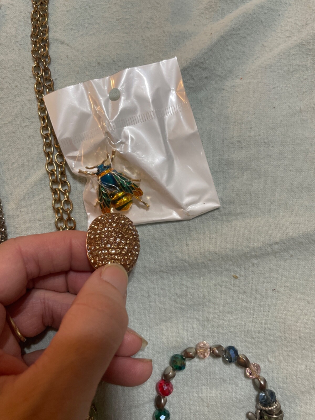 set amethyst necklace with enamel butterfly gold tone broch and 2 necklaces wit