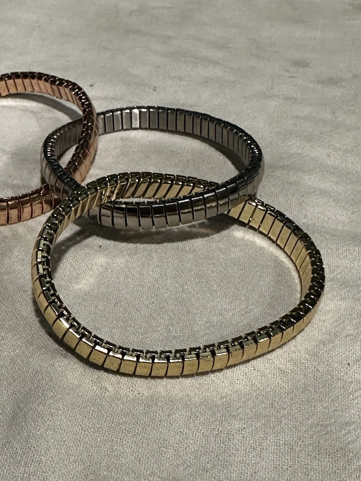 3 BAND TRI COLOR (GOLD, SILVER, ROSE GOLD) STRETCH ROLLING BRACELET SIGNED CN
