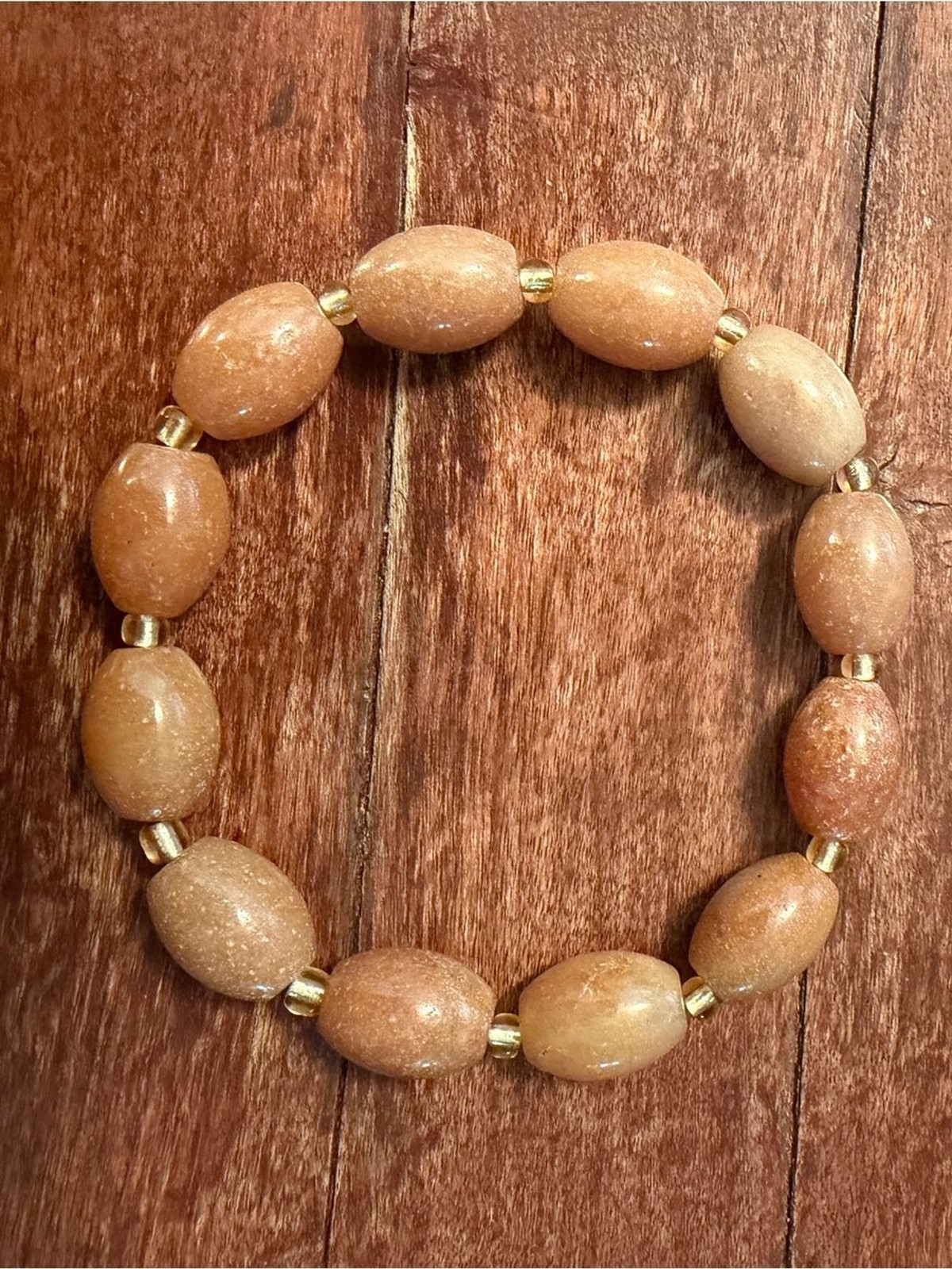 Elegant Peach Stone and Gold Bead Stretch Bracelet