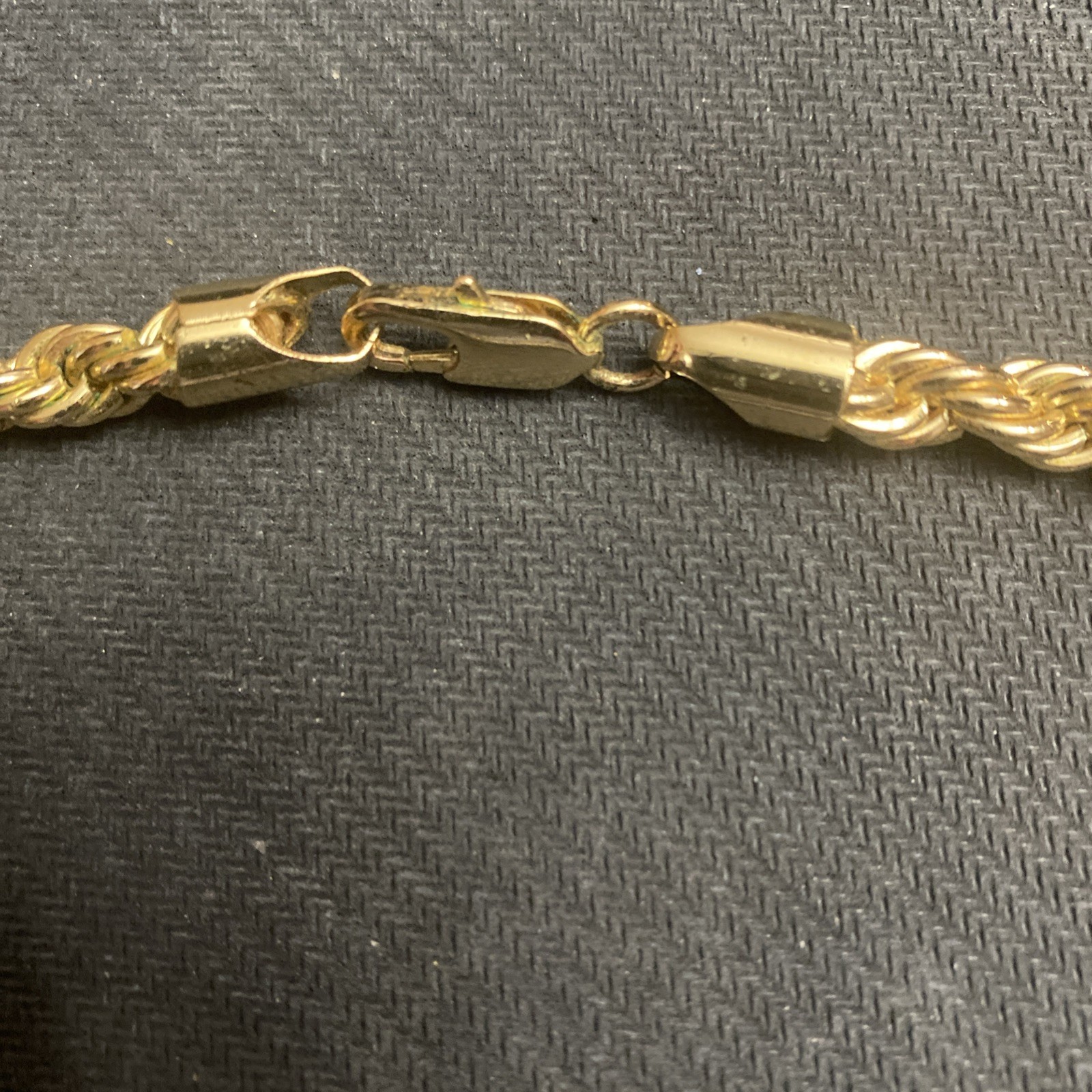Twisted rope chain, gold color, 30 inches long, very good condition