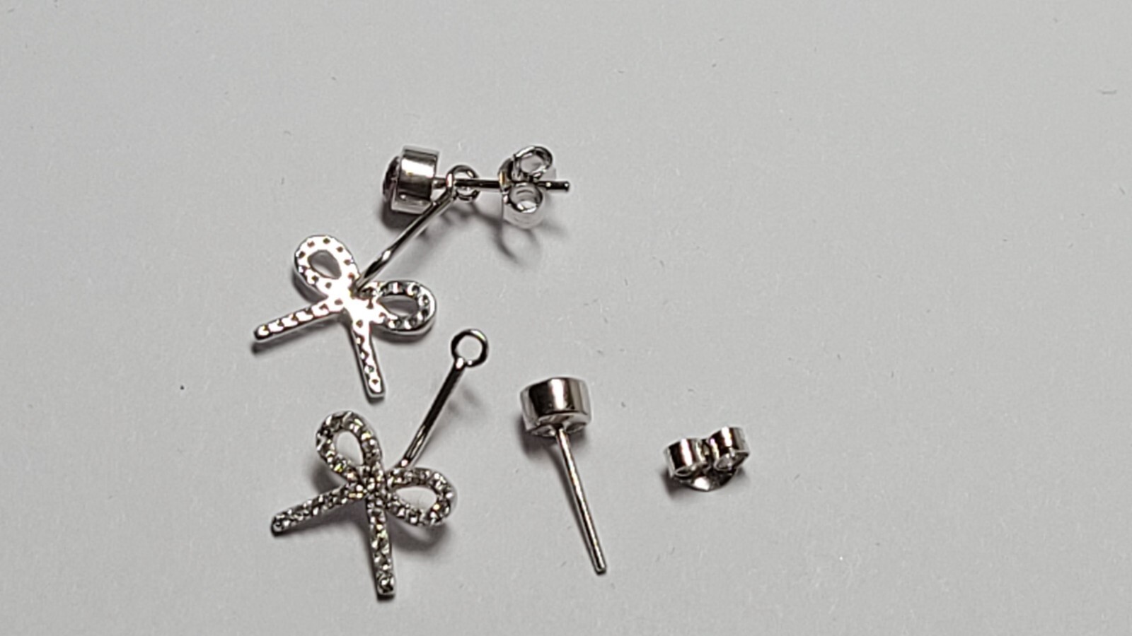 Bowtie Pink CZ Stud Earrings, 925 Silver, Rhodium Plated, CZ (STE00985)