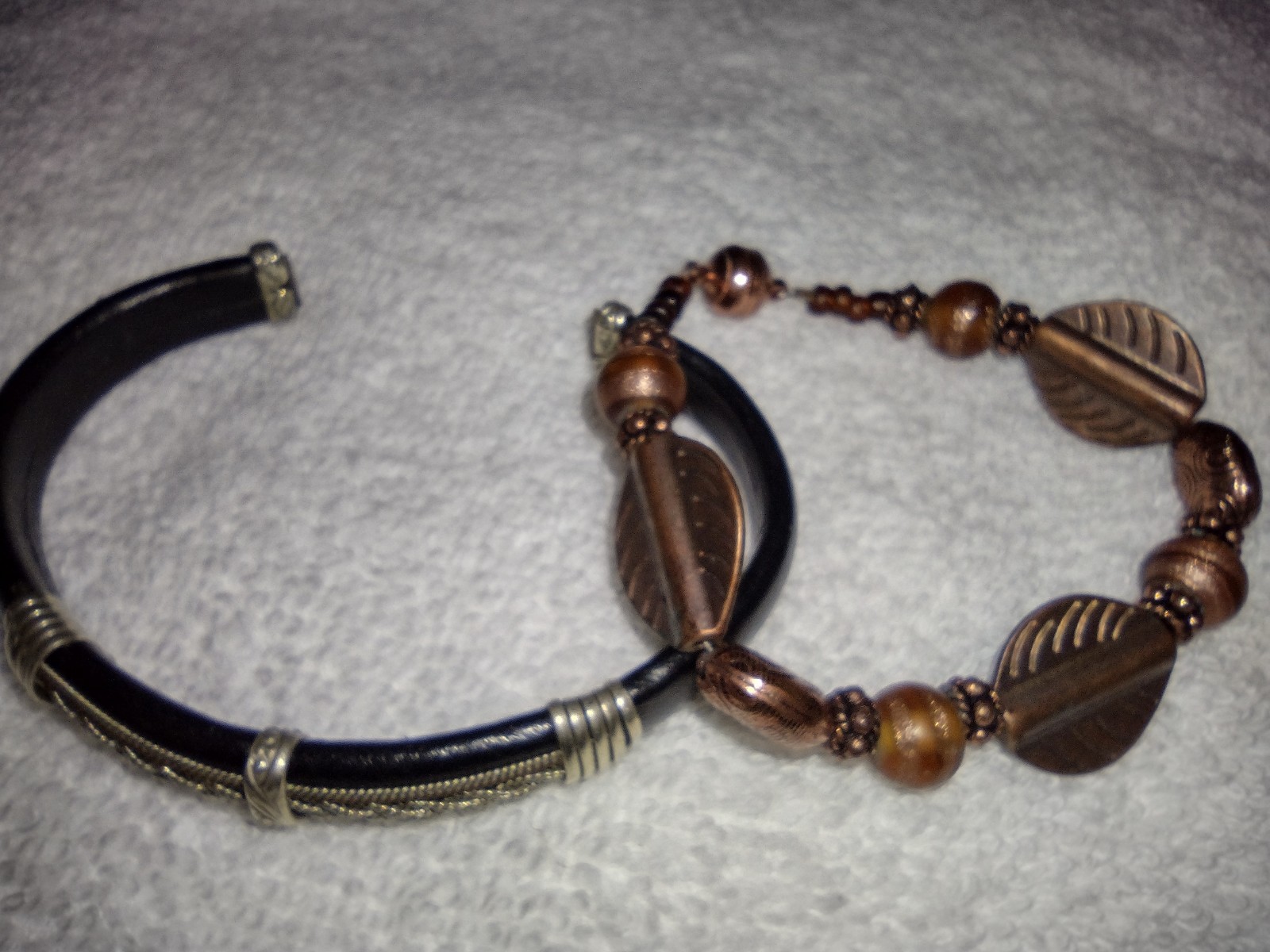 Lot of 2 brown/cooper tone decorative bracelets, one has magnetic closure