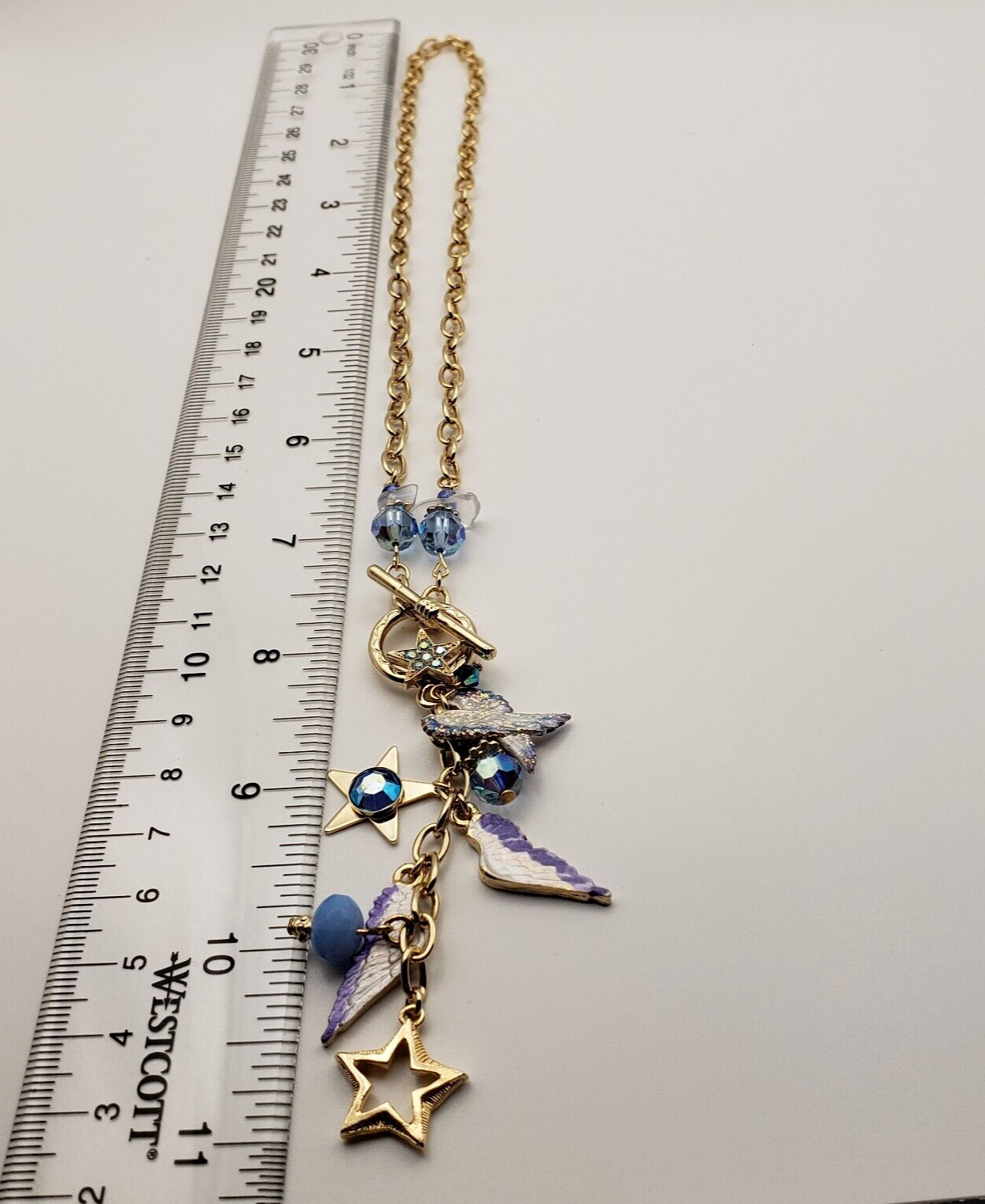 Kirks Folly Forever Angel Wings Charm Necklace Gold Tone 17in Long Blue Crystals