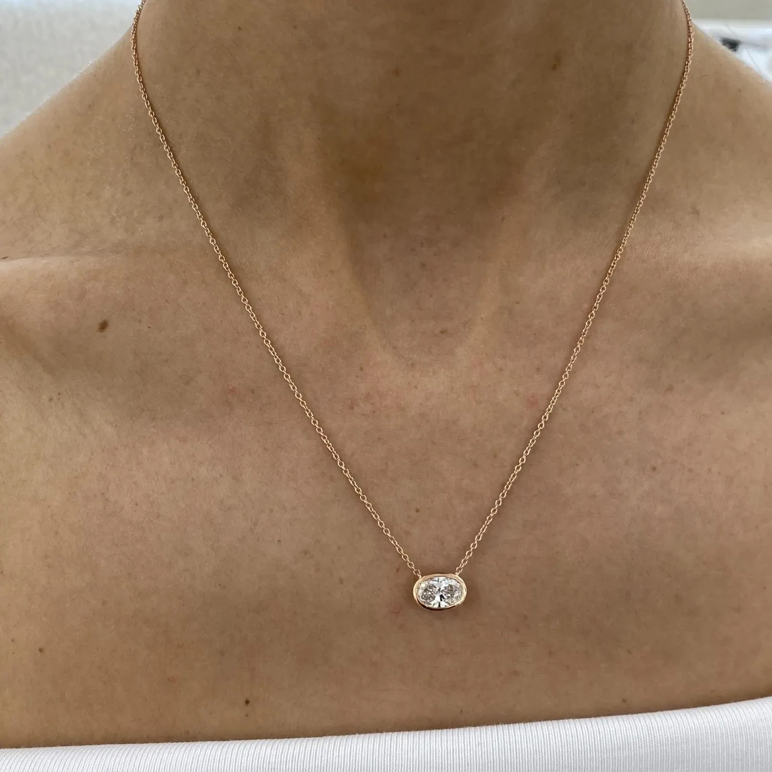 Lab Grown 1.00 Ct Oval EF VS Diamond Bezel Setting Necklace in 14K Rose Gold
