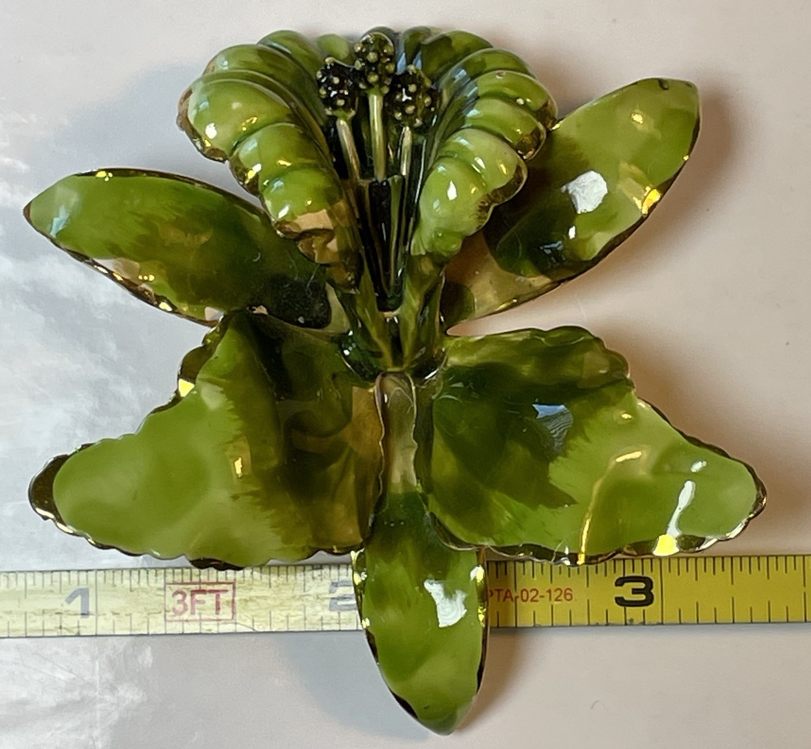 Green Enamel Lily Flower Brooch Gold Rimmed and Gold Tone Metal Pin Closure