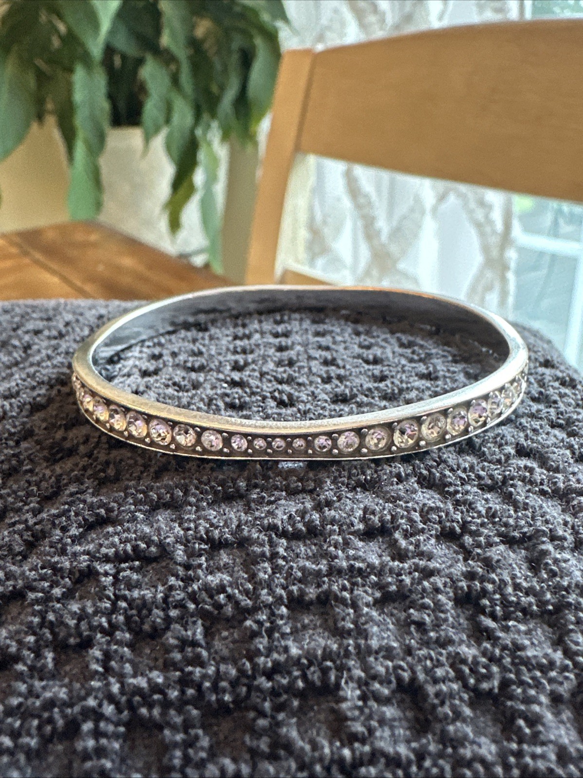 Brighton “Light Hearted” Bangle sparkling, varied-size crystal rhinestones.