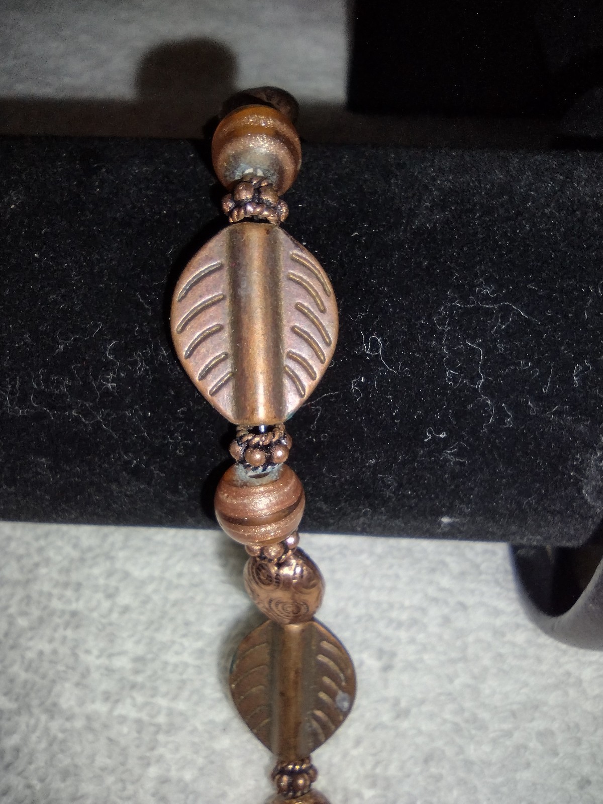 Lot of 2 brown/cooper tone decorative bracelets, one has magnetic closure