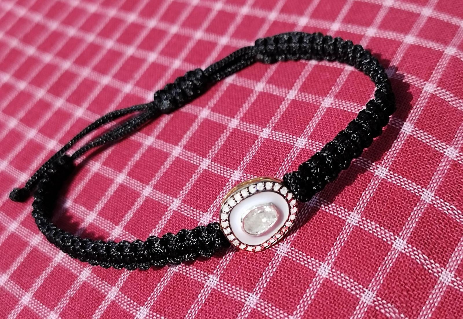 Natural Diamond White Enamel And Diamond Polki Adjustable Black Thread Bracelet.